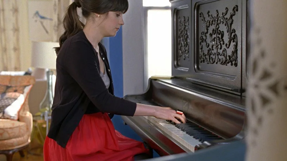 Does Zooey Deschanel Play Piano?